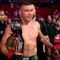 South Africa's Dricus du Plessis celebrates his victory over Sean Strickland of the US after their men's middleweight division event of the Ultimate Fighting Championship (UFC)