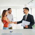 couple buying property with estate agent