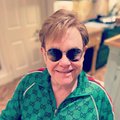 Elton John wearing dark shades