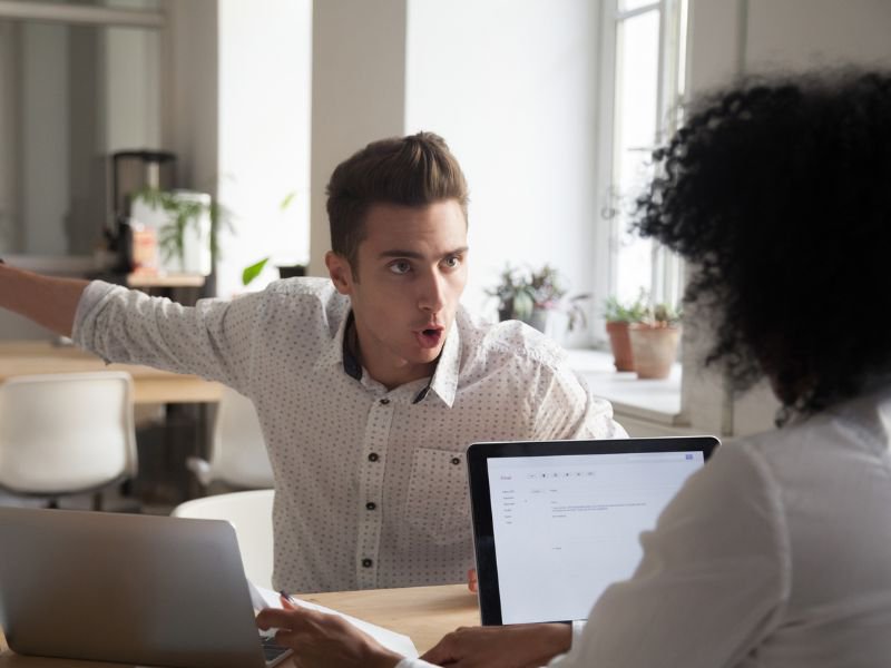 Arguing at office stock image