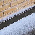 Hailstones on the floor of an attic terrace