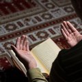 Muslim Man Reading The Quran
