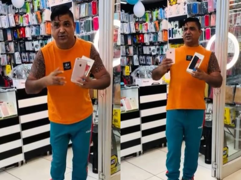 Singing cellphone shop worker