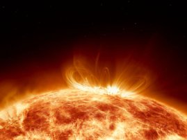 Artistic concept 3D illustration as lower third shot of solar surface with powerful bursting flares and star protuberances erupting with magnetic storms and plasma flashes