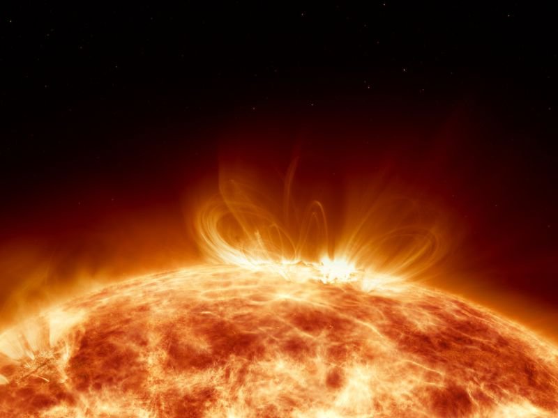 Artistic concept 3D illustration as lower third shot of solar surface with powerful bursting flares and star protuberances erupting with magnetic storms and plasma flashes