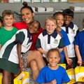 Stacey Norman with primary school kids