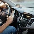 Texting and driving stock image