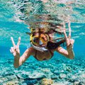 A woman snorkeling