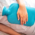 Woman with hot water bottle