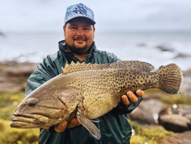 Ivan Kotze with a massive rockcod caught down South Coast