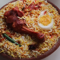 A Chicken Biryani themed candle