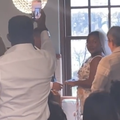 A couple getting married at a coffee shop