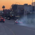 A driver doing donuts with a McLaren Senna on the streets of Los Angeles