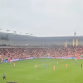 A football match in England being watched from a hotel room