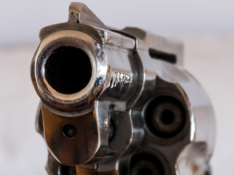 A gun pointing to the camera