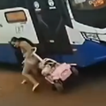 A mother and child are hit by a bus