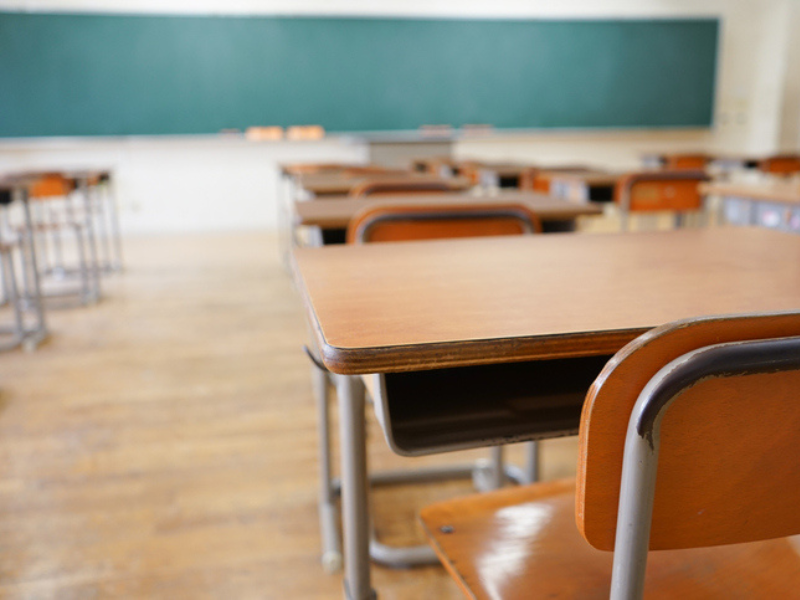 A school classroom with blackboard