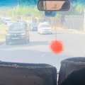 A taxi reversing ahead of oncoming traffic
