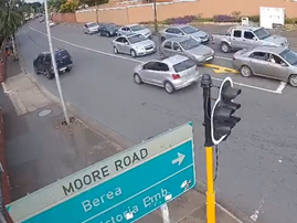 A vehicle about to hit the light pole somewhere in Durban