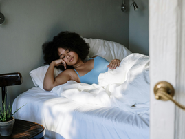 A woman sleeping in bed