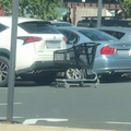 A Woolworths shopping cart rolls around a car park in Johannesburg