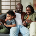 A young family using mobile gadgets
