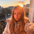 Addison Rae takes a selfie on a balcony in Paris