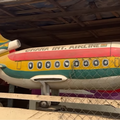 An airplane shaped coffin with the Ghana International colours
