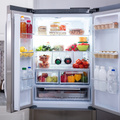 An open refrigerator with food inside
