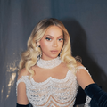Beyonce wearing a sequin dress