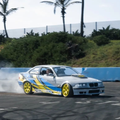 BMW car spinning in a car park