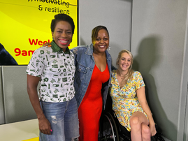 Carol Ofori and two adaptive surfers in Durban at the East Coast Radio