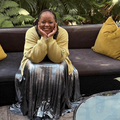 Carol Ofori sitting at Gatvol coffee shop