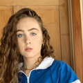 Chappell Roan with curly blonde hair