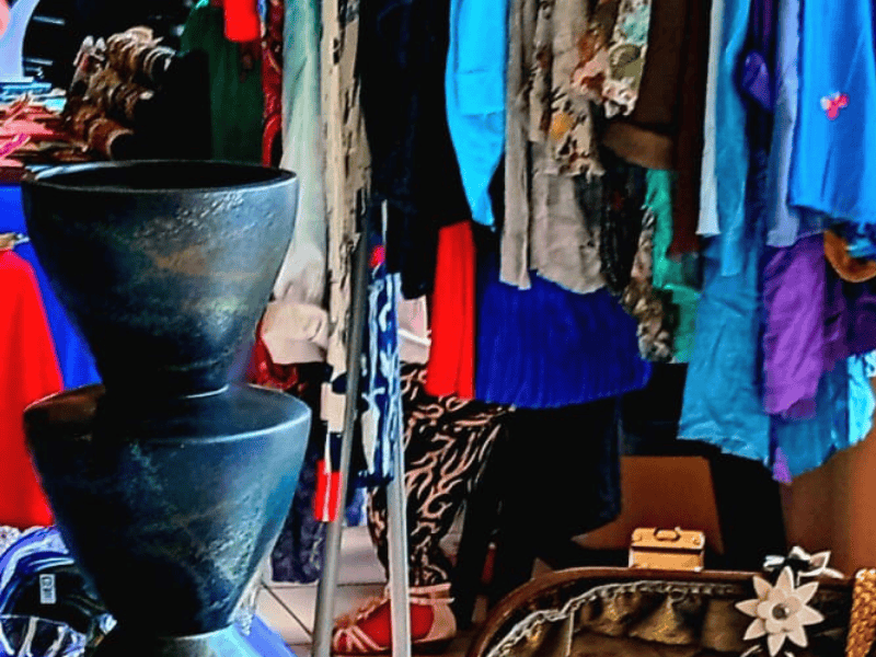 Clothes on a railing at a market