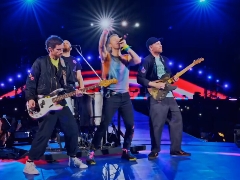 Coldplay performing onstage