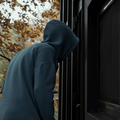 CRIMINAL_STANDING_OUTSIDE_HOME