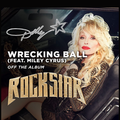 Dolly Parton wearing a gold jacket