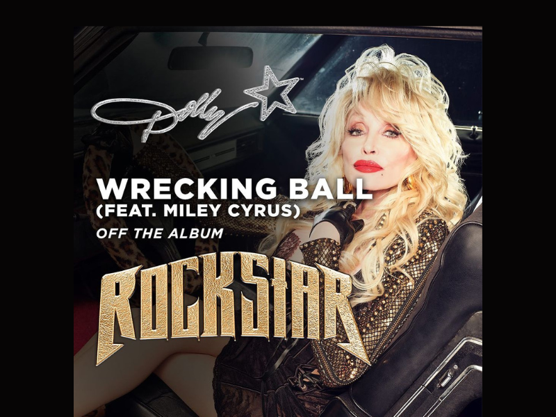 Dolly Parton wearing a gold jacket