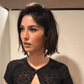 Gracie Abrams with short dark brown hair