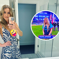 Ingrid Andress takes a selfie in a bathroom