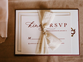 Invitation card with inscription tied with ribbon