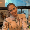 Jennifer Lopez wearing a floral jersey