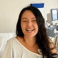 Lalla Hirayama sitting in a hospital bed