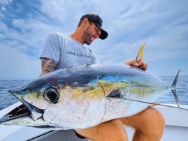 Ruan Irving with a massive Yellowfin Tuna caught at Shelly beach