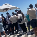 People standing in a queue at Table Mountain in Cape Town