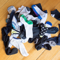 Pile of lost socks lying on the floor