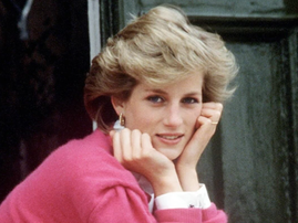Princess Diana sitting on a step