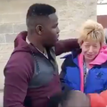 Two men help elderly woman pay for fuel/ Twitter