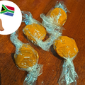 South African mebos sweets lying on wooden surface